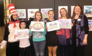 Cat in the Hat with art contest finalists and Executive Director Joan Wabschall